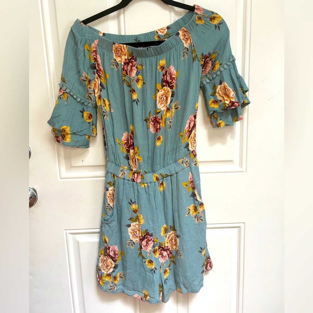 Small blue floral off shoulder romper with pockets
